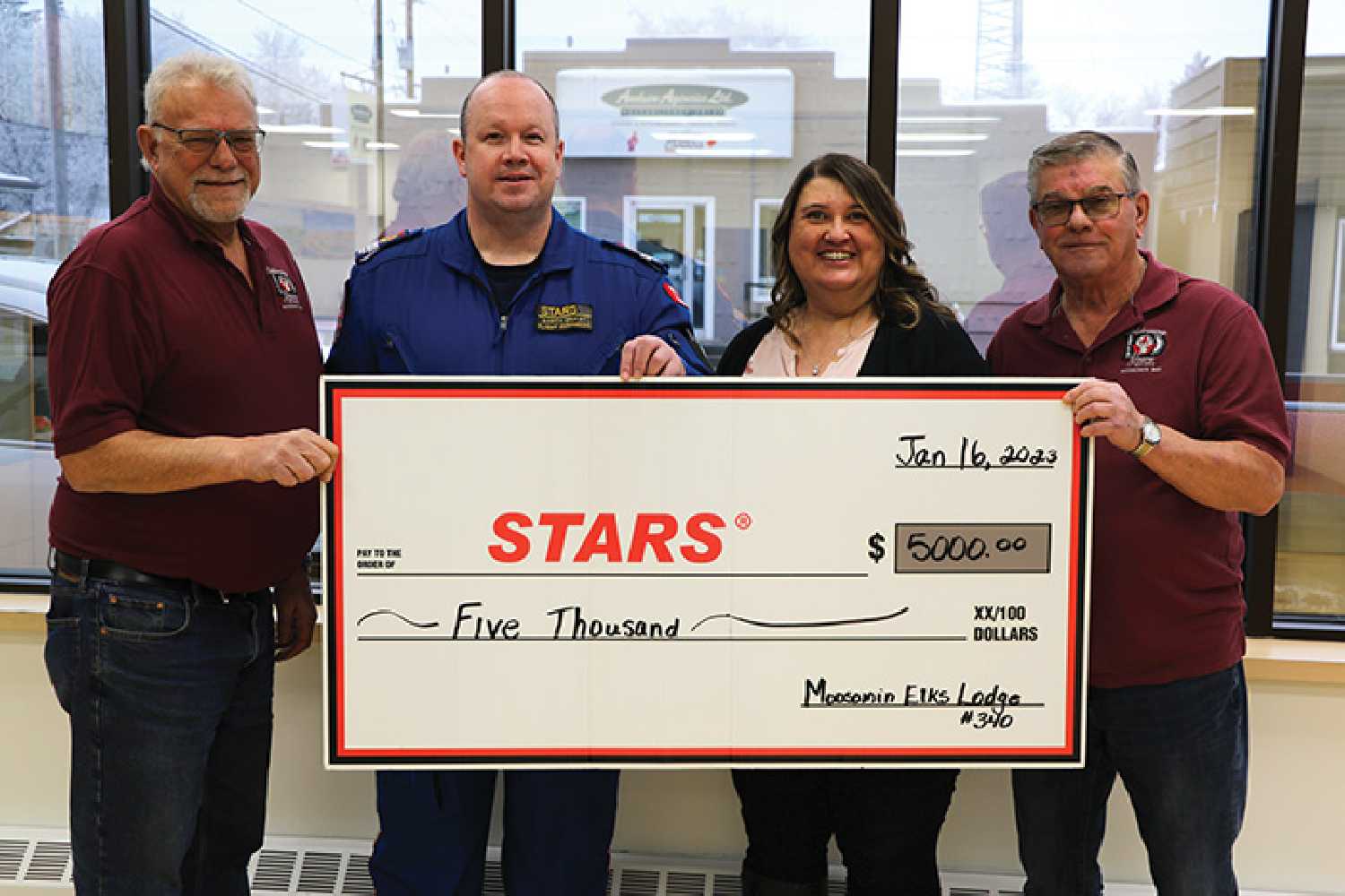 Donation to STARS The Moosomin Elks Lodge presented $5,000 last week to STARS Air Ambulance. From left are Ron Potter of the Moosomin Elks, STARS Clinical Operations Manager Darcy McKay, STARS Community Engagement Officer Kathy Skomar, and Wayne Hopkins of the Moosomin Elks, who was once a patient on a STARS Air Ambulance.